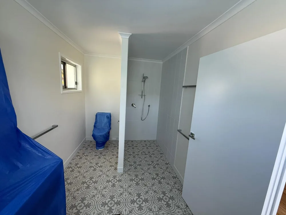 Bathroom renovation with patterned floor tiles, a Seaforth Builders project on the Gold Coast