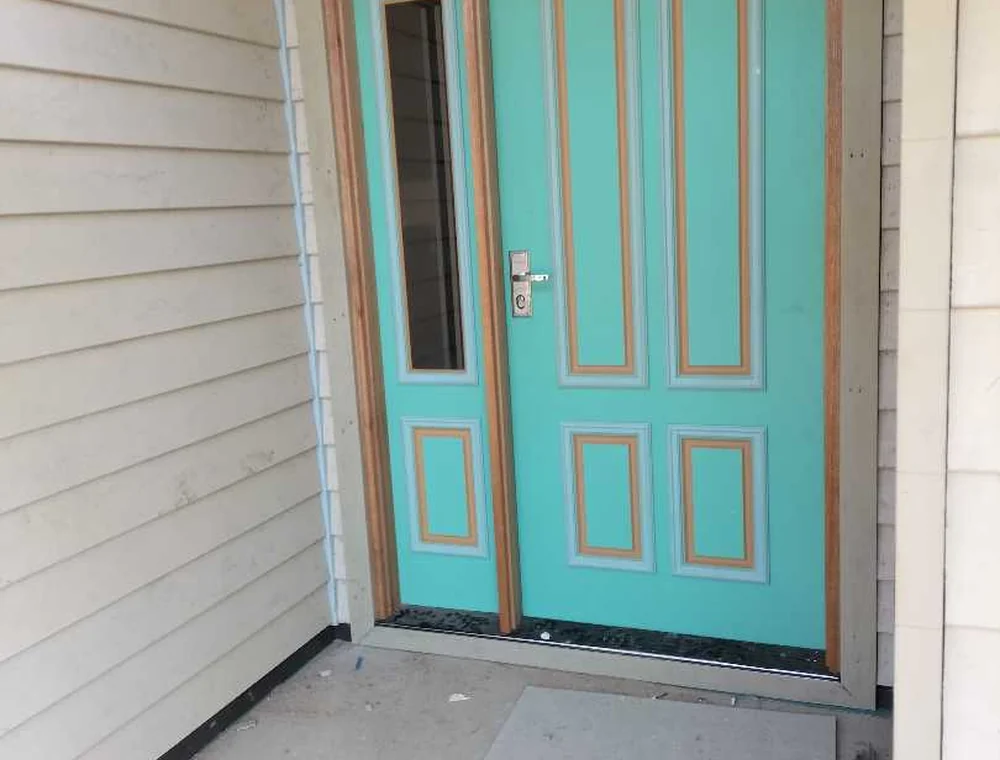 Entry door and exterior cladding, a Seaforth Builders project on the Gold Coast